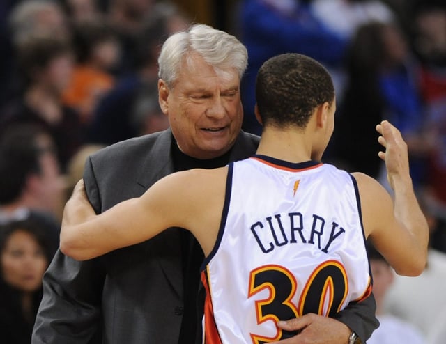 Golden State Warriors head coach Don Nelson hugs Stephen Curry, (30), as they celebrate their win over the Detroit Pistons on Saturday, Feb. 27, 2010 at the Oracle Arena in Oakland, Calif. The Warriors defeat the Pistons 95-88. (Jose Carlos Fajardo/Staff)