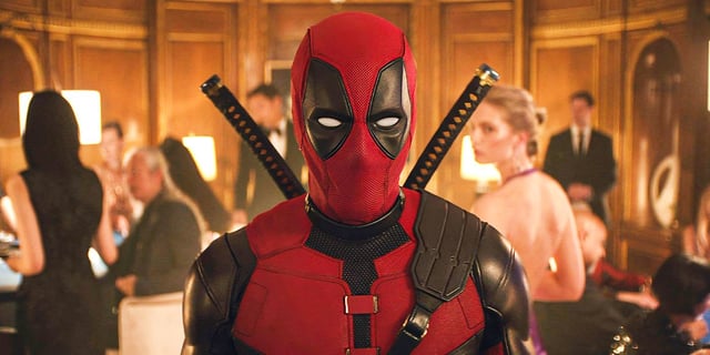 deadpool at a dinner party in Deadpool & Wolverine