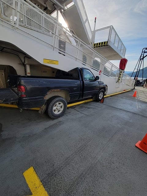 A pick-up truck is seen stuck under a galley ramp of the BC Ferries vessel Malaspina Sky in a Friday, June 6, 2025, handout photo. Police say the driver was ticketed for malfunctioning brakes. THE CANADIAN PRESS/HO-RCMP, *MANDATORY CREDIT*