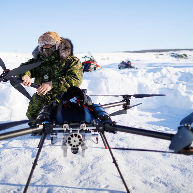 A Canadian soldier dismantles a drone during the Canadian Armed Forces' annual Arctic training and sovereignty operation, in Inuvik, NWT.