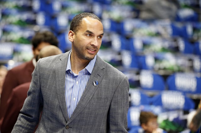 Nico Harrison of the Dallas Mavericks watches warmups before the game against the San Antonio Spurs at American Airlines Center on April 10, 2022 in Dallas, Texas.