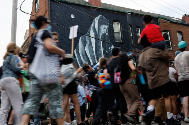 Activists march on South Carpenter Street in the Lower West Side neighborhood on June 8, 2025, in Chicago to protest recent ICE arrests in the city and around the country. The protest started at the Plaza Tenochtitlán and ended at Benito Juarez Community Academy. (Armando L. Sanchez/Chicago Tribune)