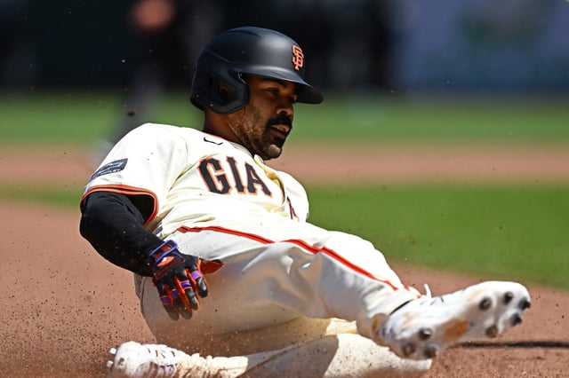 San Francisco Giants’ LaMonte Wade Jr. (31) slides into third base after hitting a triple against the Athletics in the eighth inning of their MLB game at Oracle Park in San Francisco, Calif., on Sunday, May 18, 2025. The San Francisco Giants defeated the Athletics 3-2. (Jose Carlos Fajardo/Bay Area News Group)