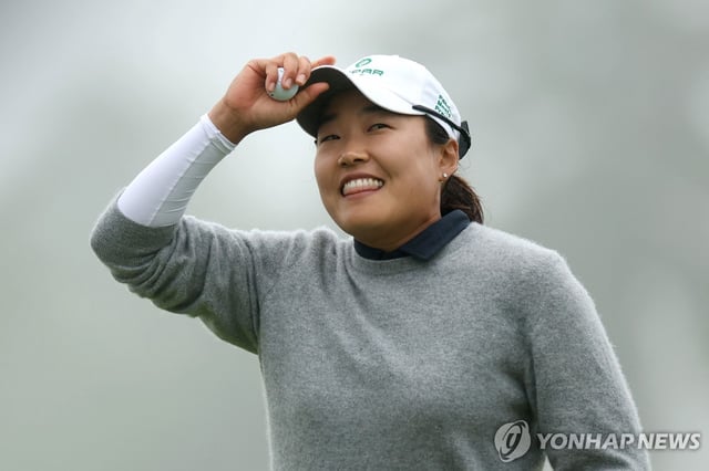 Lee Il-hee of South Korea smiles while walking on the 18th green during the final round of the ShopRite LPGA Classic at Seaview Golf Club's Bay Course in Galloway, New Jersey, on June 8, 2025, in this Getty Images photo. (Yonhap)