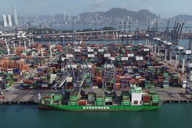 A drone view shows an Evergreen Marine container ship at a port in Kwai Chung, Hong Kong, China April 16, 2025. REUTERS/Tyrone Siu/File Photo
