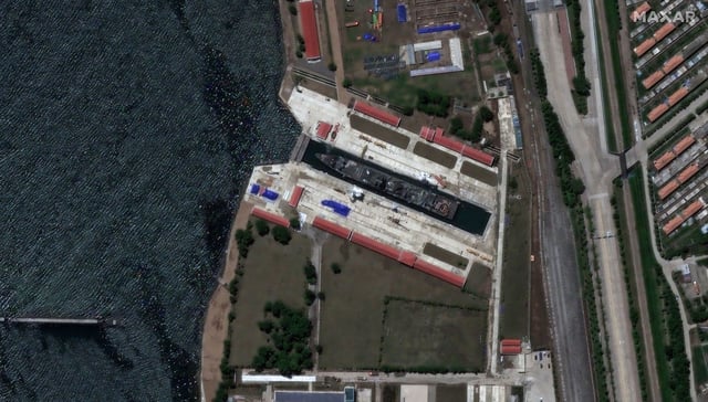 Satellite image showing North Korean Choe Hyon-class destroyer at the Rajin repair facilities.