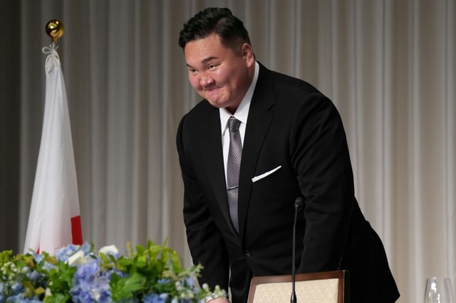 Mongolian-born former yokozuna Hakuho leaves after a press conference to announce his retirement from the sport