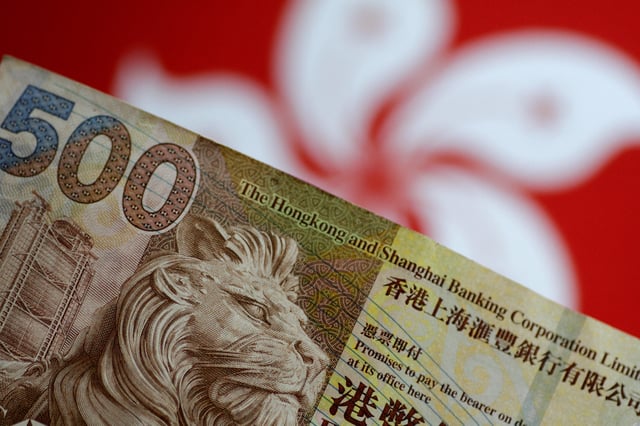 A Hong Kong dollar note is seen in this illustration photo May 31, 2017.     REUTERS/Thomas White/Illustration/File Photo