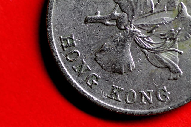 A Hong Kong dollar coin is seen in this illustration photo May 31, 2017.     REUTERS/Thomas White/Illustration/File Photo