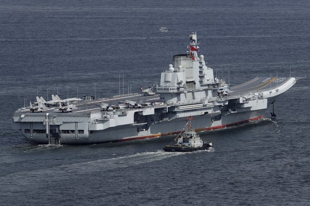 The Chinese aircraft carrier CNS Liaoning sails into Hong Kong for a port call on July 7, 2017.