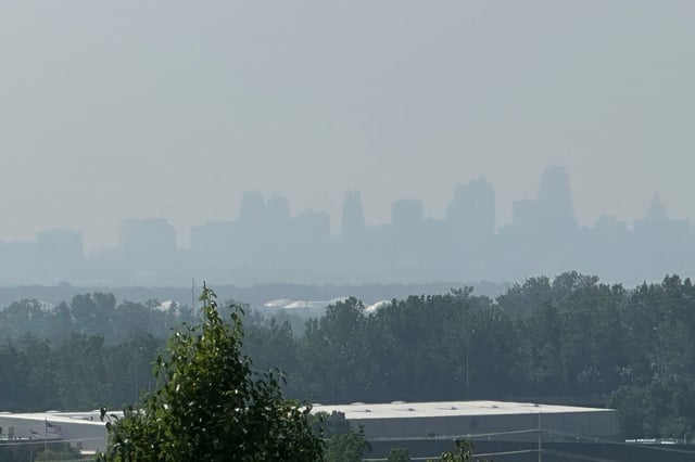 Smoke from Canadian wildfires can be seen partially obscuring the skyline of downtown Kansas City, Missouri on Wednesday, June 4, 2025.