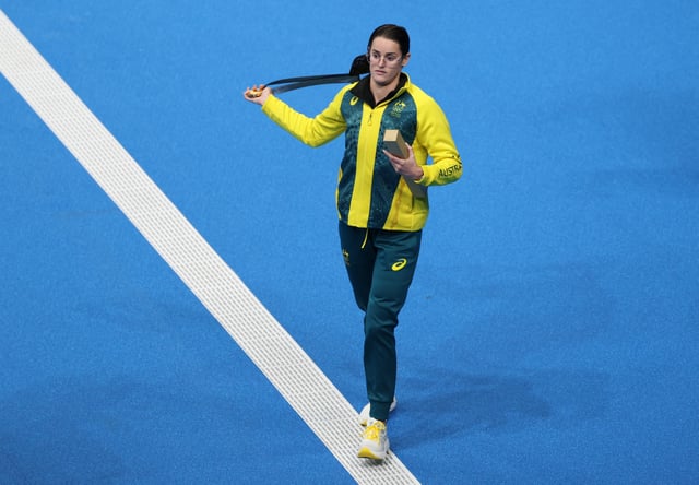 Paris 2024 Olympics - Swimming - Women's 200m Backstroke Victory Ceremony - Paris La Defense Arena, Nanterre, France - August 02, 2024. Gold medallist Kaylee McKeown of Australia with her medal after setting a new Olympic record REUTERS/Marko Djurica/File Photo