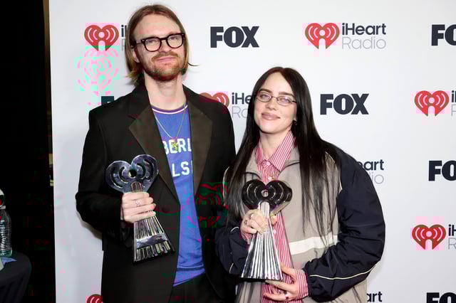 Finneas O&#39;Connell and Billie Eilish, winners of the Album of the Year - Pop award, pose on the Winners Walk during the 2025 iHeartRadio Music Awards at Dolby Theatre on March 17, 2025 in Hollywood, California.