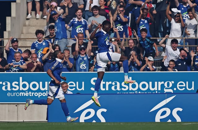 Soccer Football - Ligue 1 - RC Strasbourg v Paris St Germain - Stade de la Meinau, Strasbourg, France - May 3, 2025 RC Strasbourg's Mamadou Sarr celebrates their first goal, an own goal scored by Paris St Germain's Lucas Hernandez/File Photo