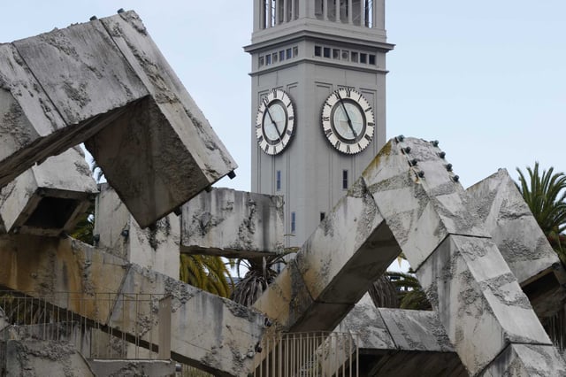 The Ferry Building looms behind Vaillancourt Fountain, which is being fenced off Monday.