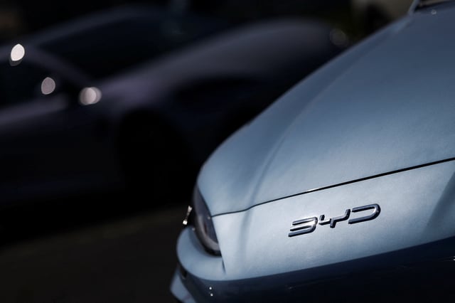 The logo of BYD is pictured on an electric car at a dealership in Reze near Nantes, France, March 27, 2025. REUTERS/Stephane Mahe/File Photo