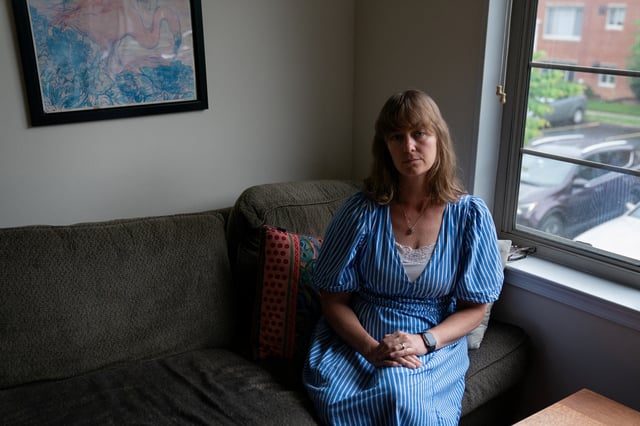 Jenna Norton, an employee at the National Institute of Diabetes and Digestive and Kidney Diseases, sits for a portrait in Bethesda, Maryland, U.S., June 8, 2025. REUTERS/Elizabeth Frantz