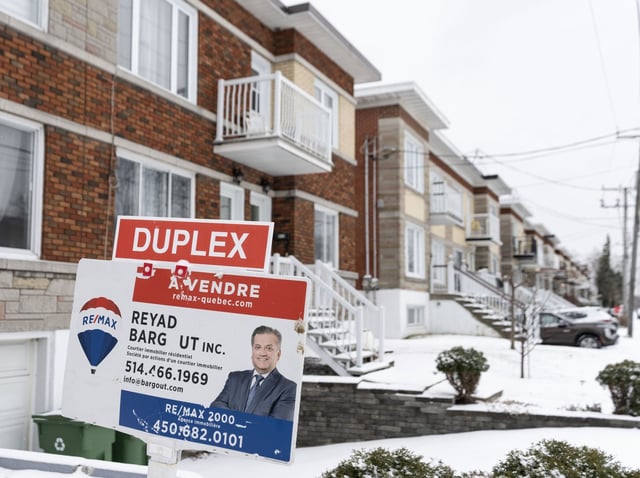 Home sales in the Montreal-area rose again in May compared with the same month a year ago, as the city's real estate board says both activity and price growth show no signs of tapering off. A real estate sign shows a home for sale in Montreal on Monday, March 24, 2025. THE CANADIAN PRESS/Christinne Muschi