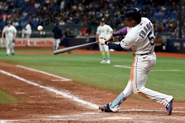 Aug 11, 2023; St. Petersburg, Florida, USA; Tampa Bay Rays shortstop Wander Franco (5) hits a walk off home run in the ninth inning against the Cleveland Guardians at Tropicana Field. Mandatory Credit: Jonathan Dyer-USA TODAY Sports/File Photo