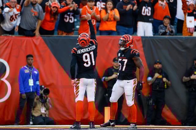 CINCINNATI, OHIO - NOVEMBER 3: Trey Hendrickson #91 of the Cincinnati Bengals celebrates with Germaine Pratt #57 during the second half of a game against the Las Vegas Raiders at Paycor Stadium on November 3, 2024 in Cincinnati, Ohio.