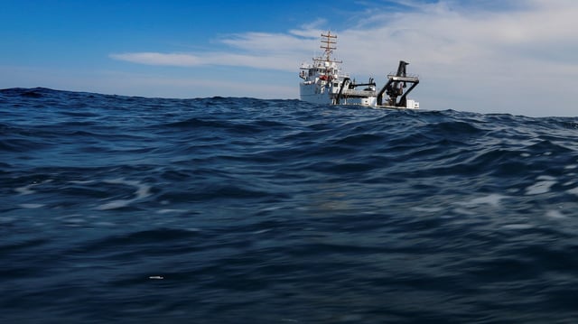 The Nancy Foster, a U.S. National Oceanic and Atmospheric Administration ship, travels over Gray’s Reef, about 20 miles off the coast of Georgia, Aug. 7, 2019 (AP Photo by Robert F. Bukaty).
