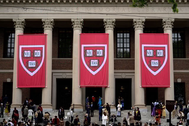 Harvard banners in front Widener Library during the 374th Harvard Commencement in Harvard Yard in Cambridge, Massachusetts, on May 29.