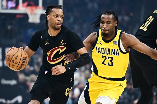May 13, 2025; Cleveland, Ohio, USA; Cleveland Cavaliers guard Darius Garland (10) drives to the basket against Indiana Pacers forward Aaron Nesmith (23) during the first quarter of game five of the second round for the 2025 NBA Playoffs at Rocket Arena. Mandatory Credit: Ken Blaze-Imagn Images/File Photo