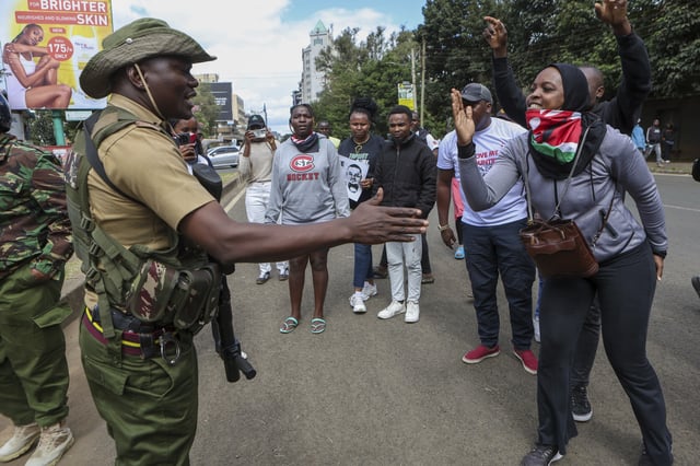 Demonstrators react to the death of Kenyan blogger Albert Ojwang, who died while in police custody, in Nairobi, Monday, June 9, 2025. (AP Photo/Andrew Kasuku)