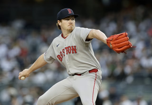 NEW YORK, NEW YORK - JUNE 08: Hunter Dobbins #73 of the Boston Red Sox pitches during the first inning against the New York Yankees at Yankee Stadium on June 08, 2025 in New York City.