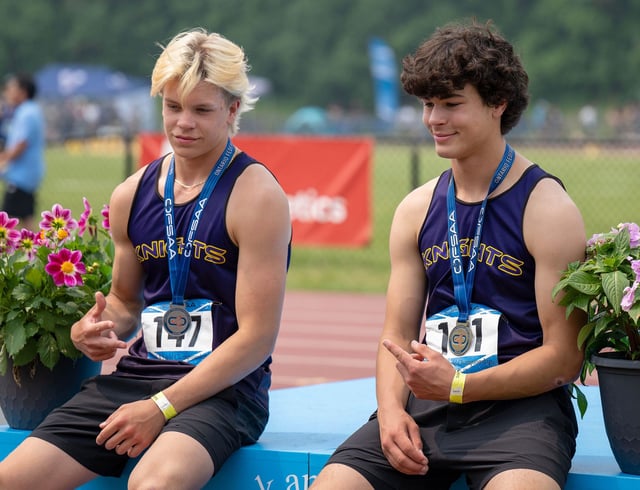 Lo-Ellen track athletes Levi Blouin and Mikko Leinala pose for a photo at the 2025 OFSAA championships.