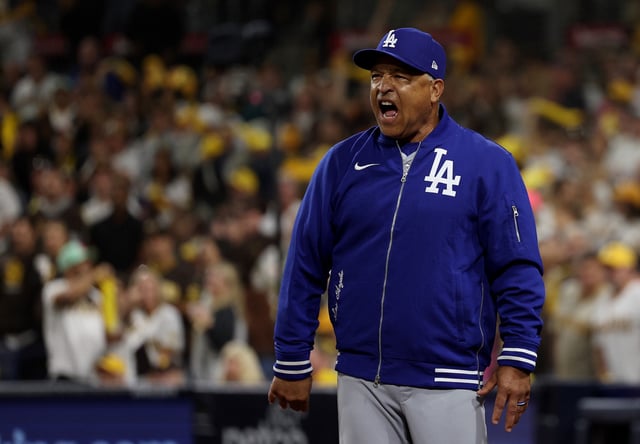 SAN DIEGO, CALIFORNIA - OCTOBER 09: Manager Dave Roberts after Shohei Ohtani #17 of the Los Angeles Dodgers is thrown out at home plate in the fourth inning during Game Four of the Division Series against the San Diego Padres at Petco Park on October 09, 2024 in San Diego, California.