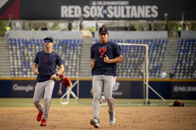 Kyle Hudson #84 of the Boston Red Sox runs alongside Roman Anthony #48 of the Boston Red Sox before a game against the Monterrey Sultanes on March 24, 2025 at Estadio Mobil Super in Monterrey, Mexico.