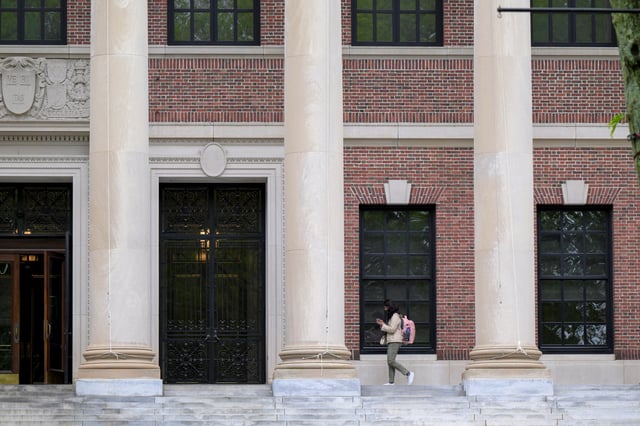 A student walks on the campus of Harvard University in Cambridge, Massachusetts, U.S., May 23, 2025.   REUTERS/Faith Ninivaggi/File Photo
