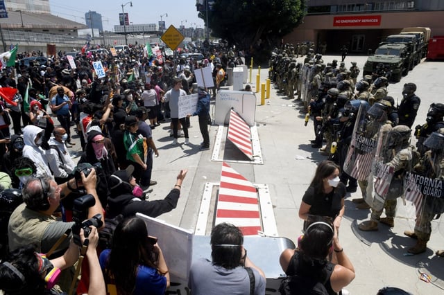 National Guard troops have begun arriving in Los Angeles on orders from President Donald Trump to stamp out protests that have broken out in recent days against federal immigration authorities seeking to carry out deportations in the region. The members of California’s National Guard were seen staging early Sunday at the federal complex in downtown Los Angeles that includes the Metropolitan Detention Center, where confrontations occurred the last two days.on Sunday, June 8, 2025. (Photo by Axel Koester, Contributing Photographer)