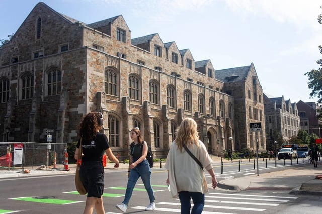 University of Michigan students walk past campus buildings on State Street in September 2023 in Ann Arbor, Michigan. Photo: Tribune News Service