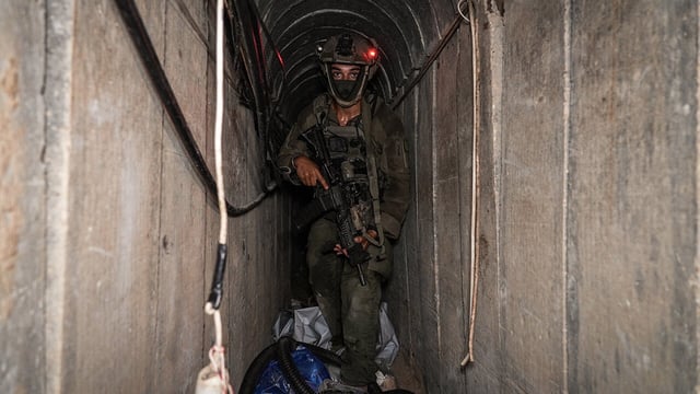 An Israeli soldier walks through a tunnel at the European Hospital in Khan Yunis in the Gaza Strip, June 8th 2025