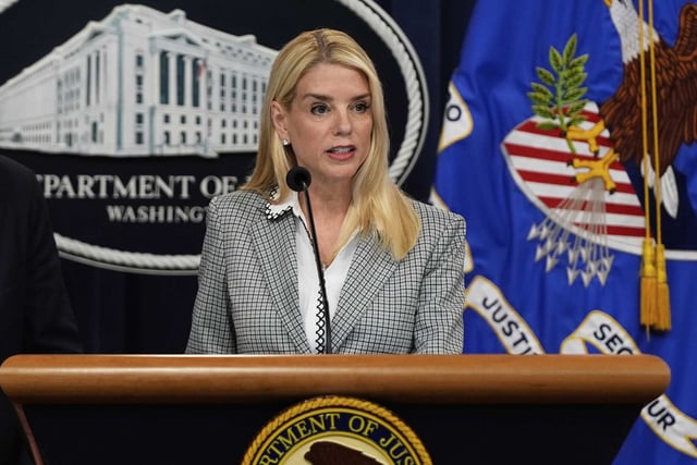 Attorney General Pam Bondi speaking at a news conference. The Department of Justice filed a civil rights lawsuit against an Oakland coffee shop.