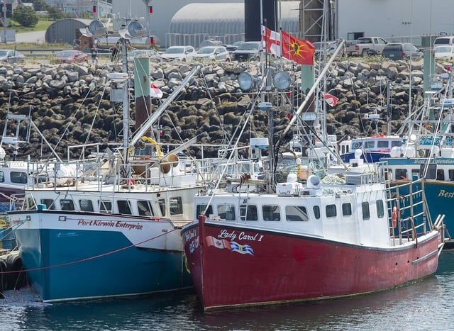 Fishing boats from the Sipekne'katik First Nation prepare for the start of its self-regulated treaty lobster fishery in Saulnierville, N.S. on Monday, Aug. 16, 2021. THE CANADIAN PRESS/Andrew Vaughan