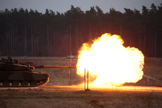 A K2 tank, delivered in the first batch of arms from South Korea under contracts signed in recent months, fires during a military drill at a military range in Wierzbiny near Orzysz, Poland, March 30, 2023. REUTERS/Kacper Pempel/File Photo