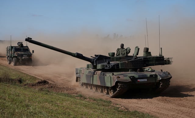 Polish soldiers ride the South Korean-made K2 tank during trial drills prior to annual artillery show ‘Autumn Fire 23’ at a military range in Bemowo Piskie near Orzysz, Poland, September 16, 2023. REUTERS/Kacper Pempel/File Photo