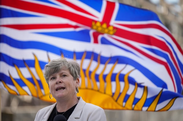 Then B.C. Minister of Energy, Mines and Low Carbon Innovation, Josie Osborne, speaks during a news conference in Burnaby, B.C., on June 10, 2024. THE CANADIAN PRESS/Darryl Dyck