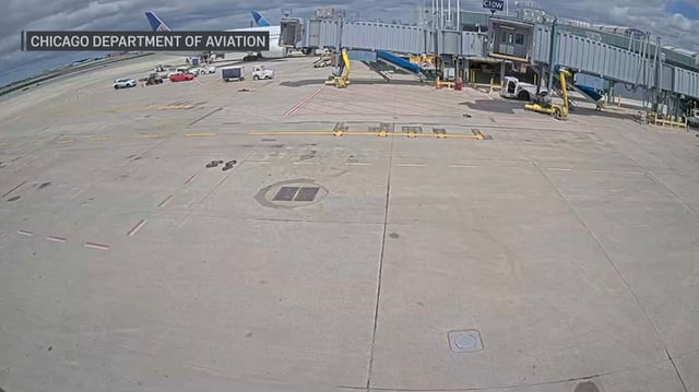 Video shows a red vehicle on the tarmac at O’Hare International Airport on Saturday, May 17. 
