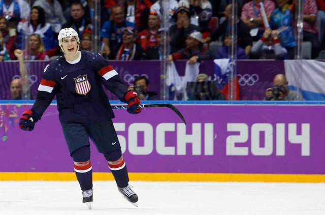 FILE – USA forward T.J. Oshie reacts after scoring the winning goal in a shootout against Russia during overtime of a men’s ice hockey game at the 2014 Winter Olympics, Saturday, Feb. 15, 2014, in Sochi, Russia. (AP Photo/Mark Humphrey, File)