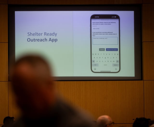 More than a hundred people listen during a symposium about a new app called Shelter Ready which helps individuals experiencing homelessness find shelter space and how it works on Monday, June 9, 2025 in San Diego, California.   (Ana Ramirez / The San Diego Union-Tribune)