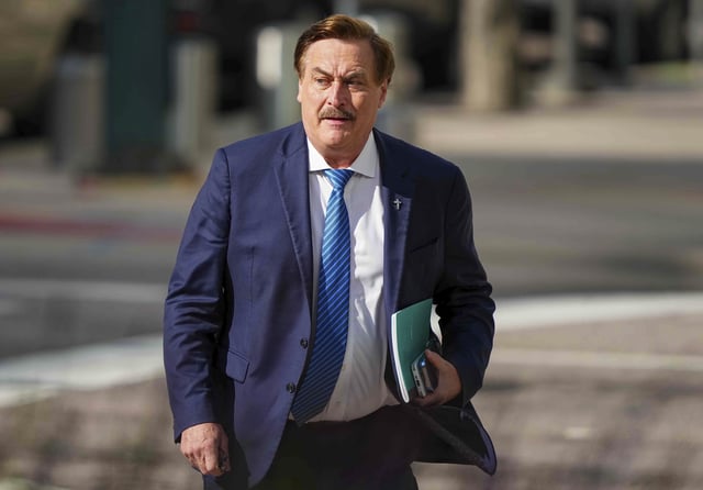 Mike Lindell walks into federal district court for a defamation trial on Thursday, June 5, 2025, in Denver. (AP Photo/Jack Dempsey)