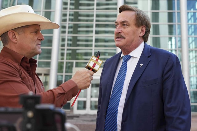 Mike Lindell talks to the media on his way into federal district court for a defamation trial on Thursday, June 5, 2025, in Denver. (AP Photo/Jack Dempsey)