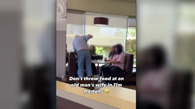 A still frame from a viral video showing a physical altercation in a Saanich Tim Hortons.