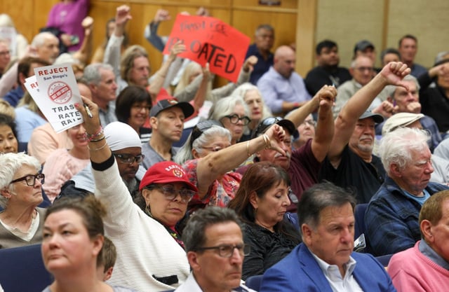 People react negatively as trash pickup fees are discussed during a San Diego City Council meeting at City Hall in San Diego on Monday, June 9, 2025. (Hayne Palmour IV / For The San Diego Union-Tribune)