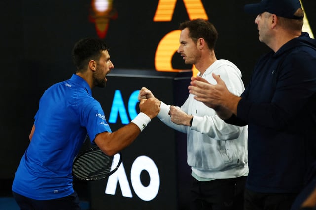 Tennis - Australian Open - Melbourne Park, Melbourne, Australia - January 22, 2025 Serbia's Novak Djokovic celebrates with his coach Andy Murray after winning his quarter final match against Spain's Carlos Alcaraz REUTERS/Edgar Su/File Photo