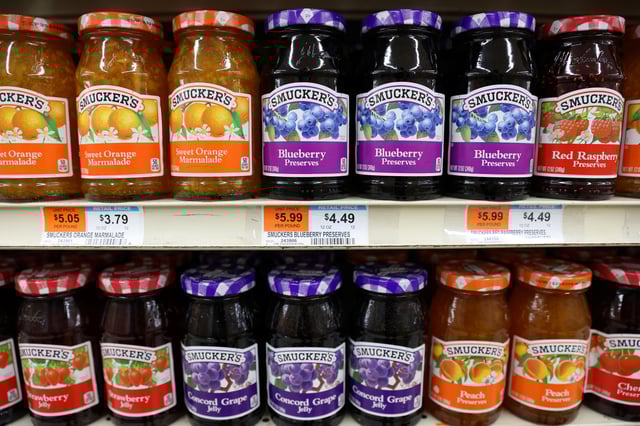 A range of Smucker's marmalade, preserves and jelly, a brand owned by The J.M. Smucker Company, is seen for sale in a store in Manhattan, New York City, U.S., November 22, 2021. REUTERS/Andrew Kelly/ File Photo